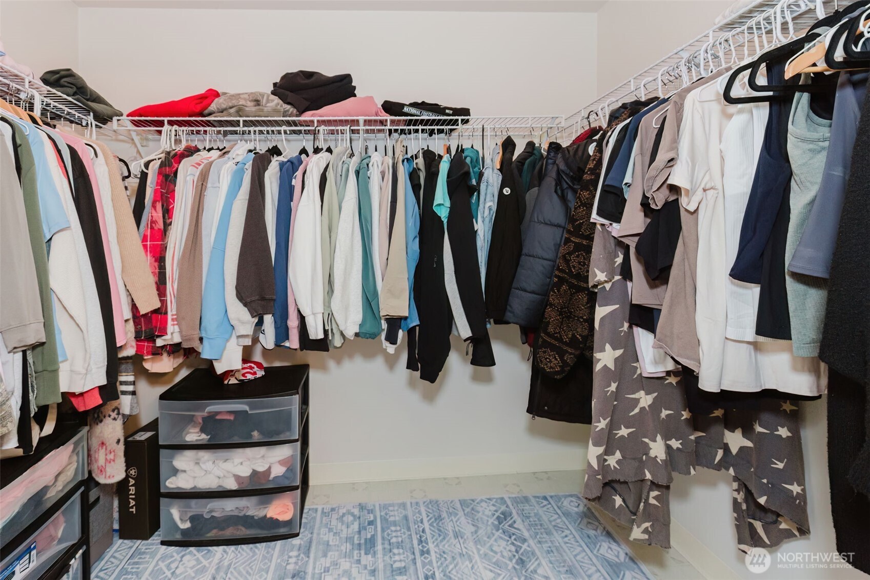 8324 Sweetbrier Loop Southeast Olympia, WA 98513 - Photo 24 of 39 a view of walk in closet with clothes and shoes