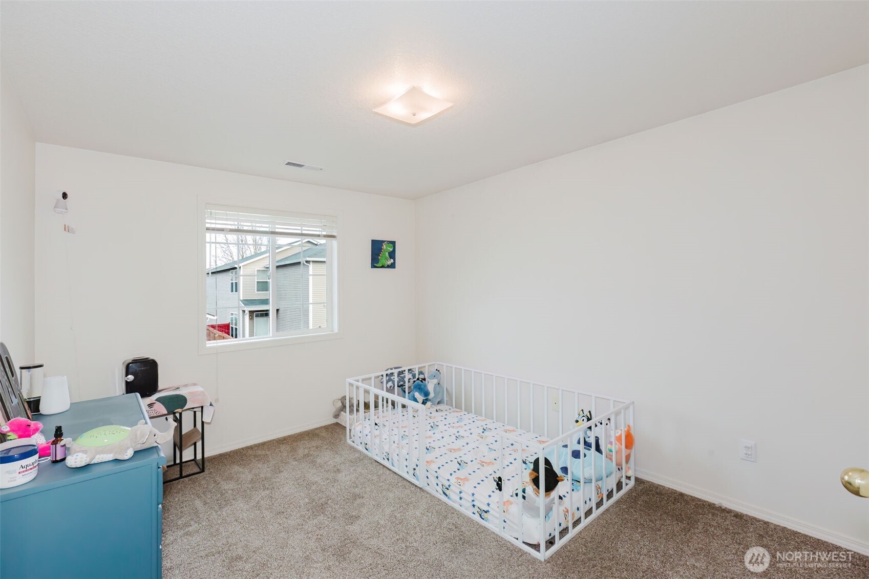 8324 Sweetbrier Loop Southeast Olympia, WA 98513 - Photo 25 of 39 a bedroom with a bed and a window