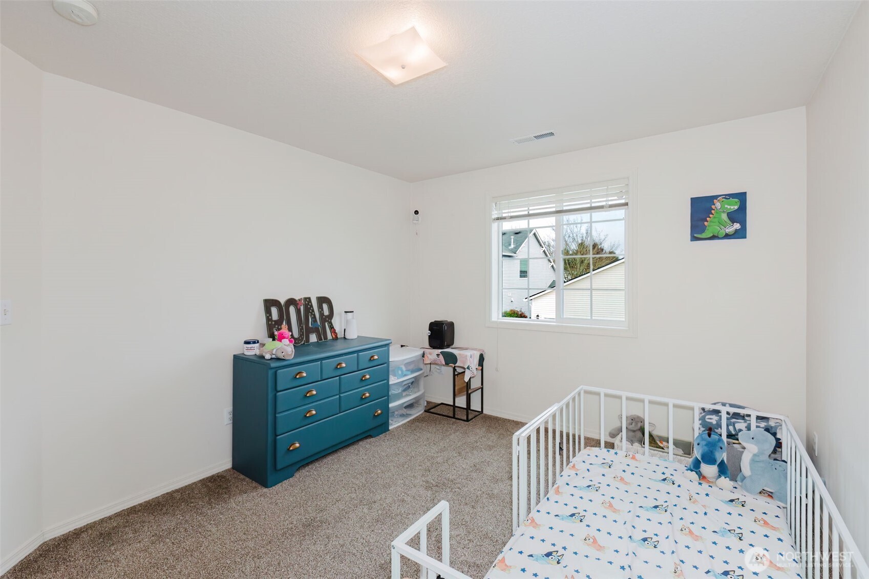 8324 Sweetbrier Loop Southeast Olympia, WA 98513 - Photo 26 of 39 a bedroom with a bed and a window