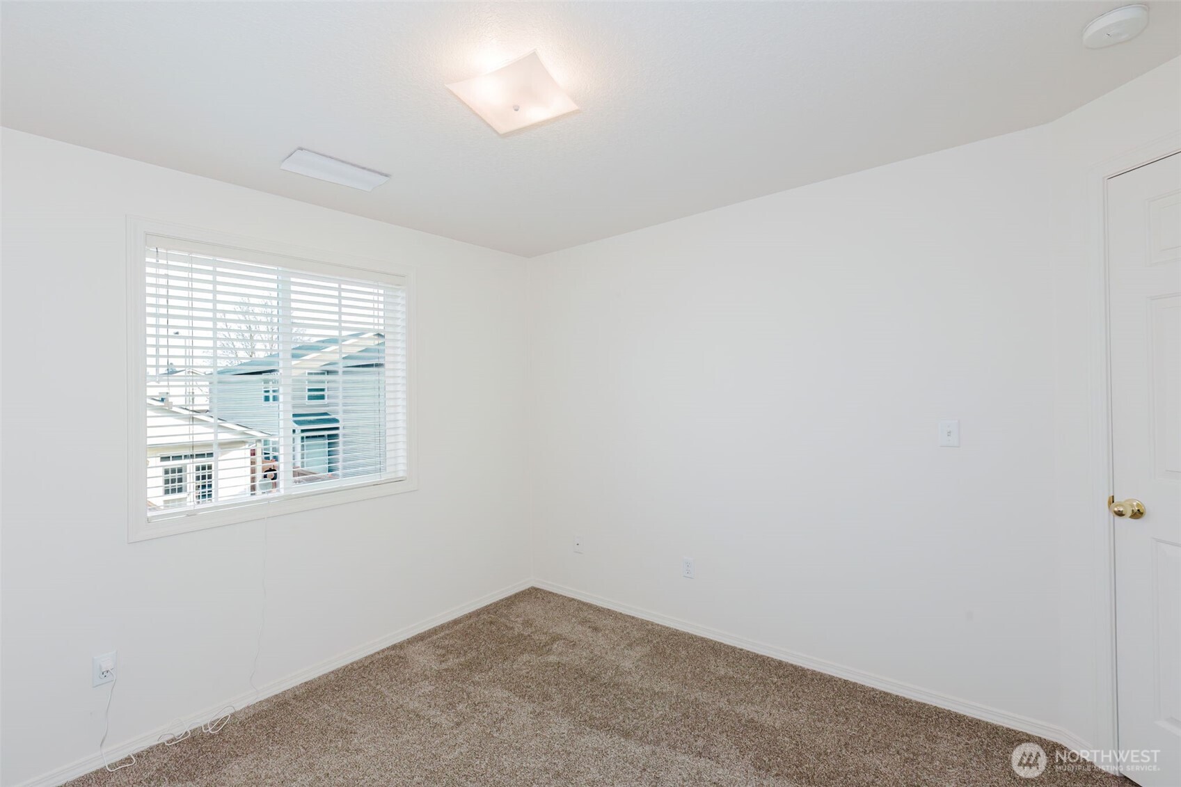 8324 Sweetbrier Loop Southeast Olympia, WA 98513 - Photo 30 of 39 an empty room with a window