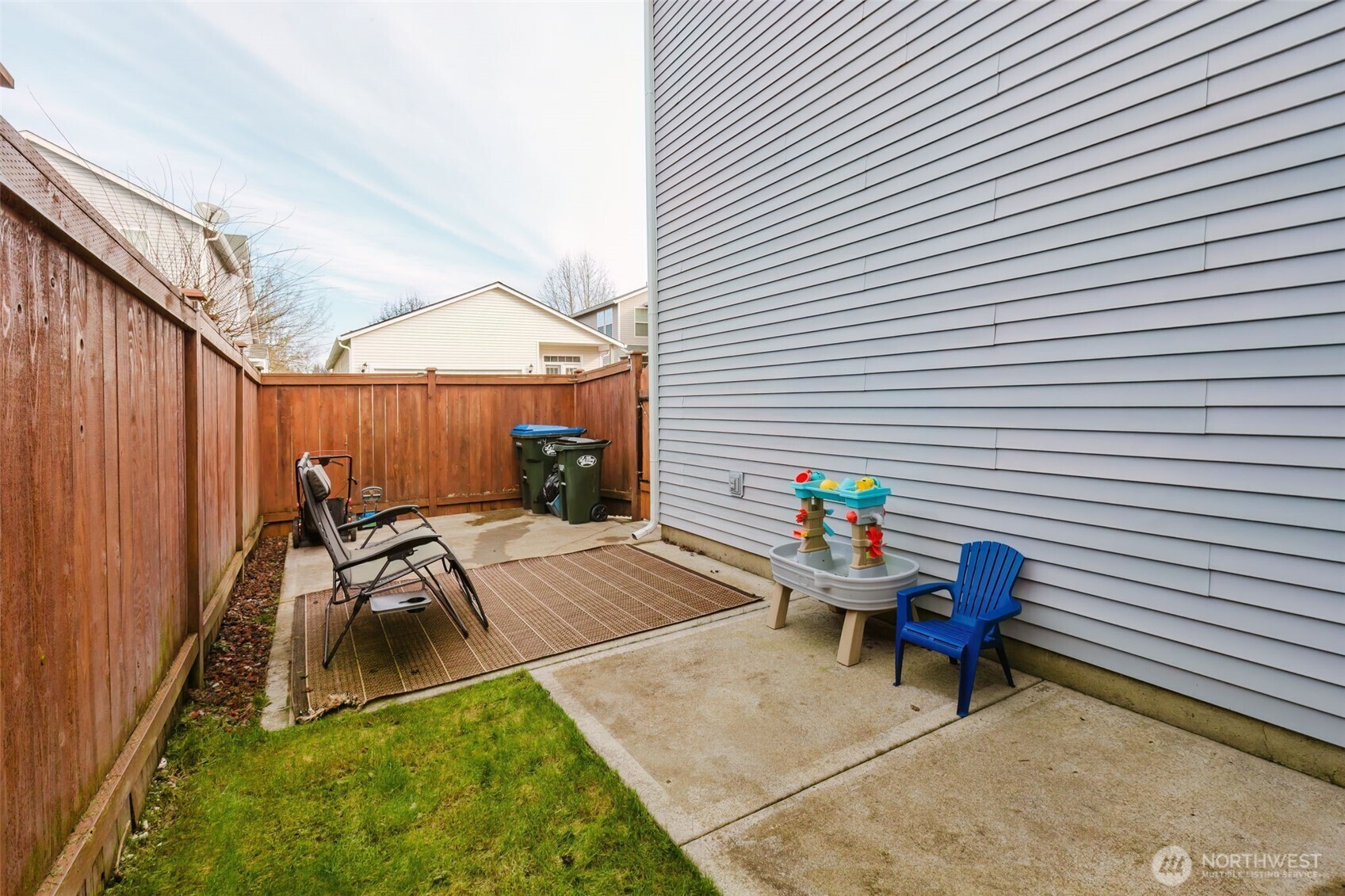 8324 Sweetbrier Loop Southeast Olympia, WA 98513 - Photo 35 of 39 a backyard of a house with outdoor seating