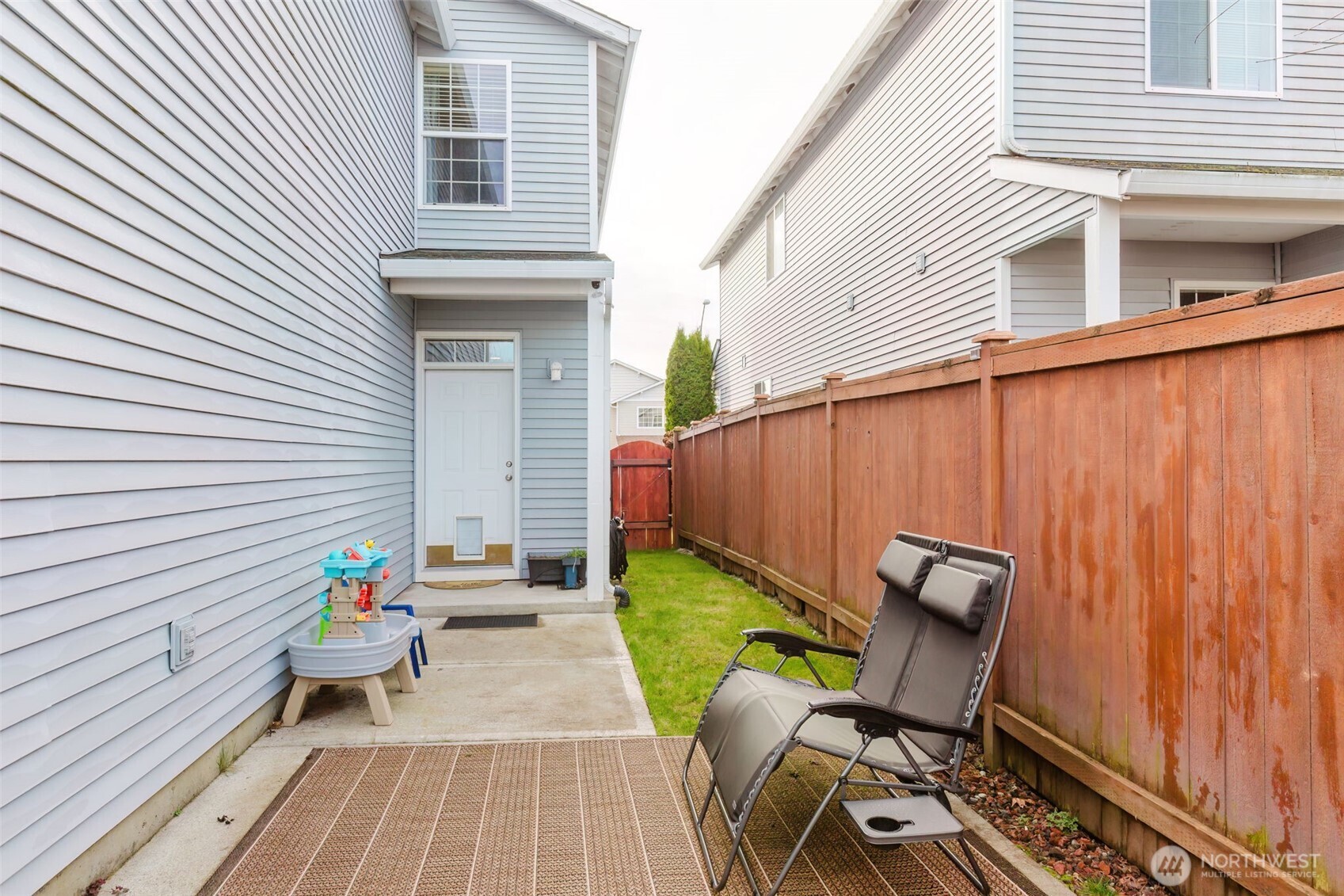 8324 Sweetbrier Loop Southeast Olympia, WA 98513 - Photo 36 of 39 a view of a two chairs in the balcony
