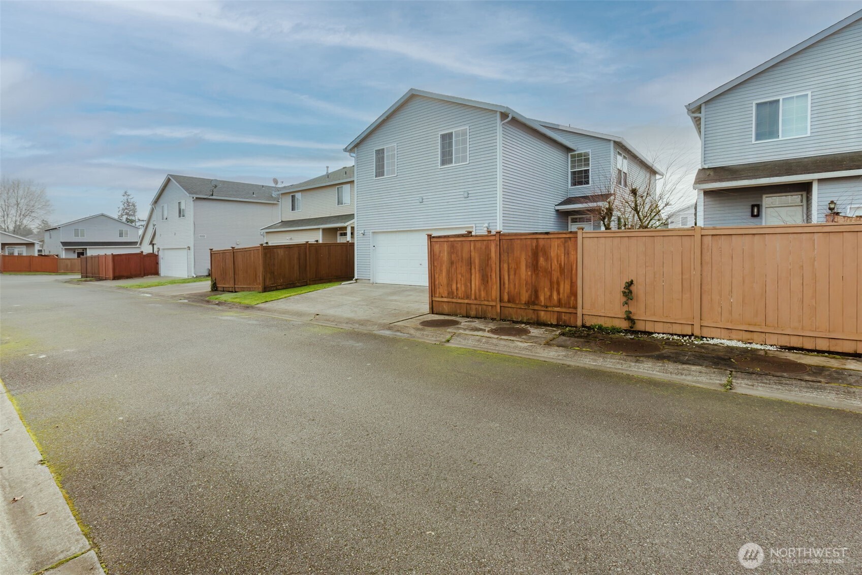 8324 Sweetbrier Loop Southeast Olympia, WA 98513 - Photo 38 of 39 a view of a car park in front of a house