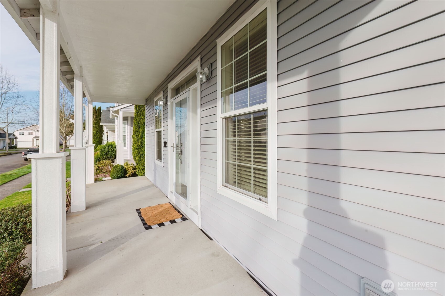 8324 Sweetbrier Loop Southeast Olympia, WA 98513 - Photo 4 of 39 a backyard of a house with outdoor seating