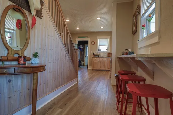 a kitchen with wooden cabinets and sink