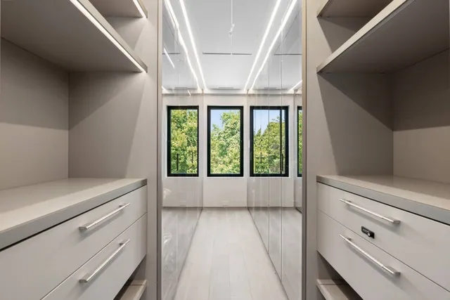 a view of room with window and hardwood