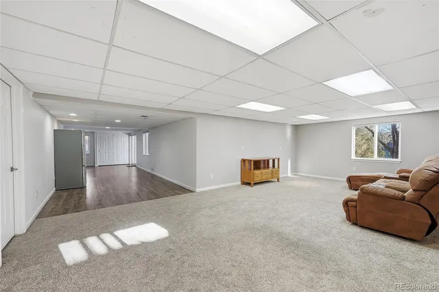 a view of livingroom with furniture and window