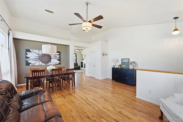 a view of a livingroom with furniture and wooden floor