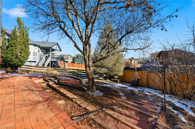 a view of a backyard of the house