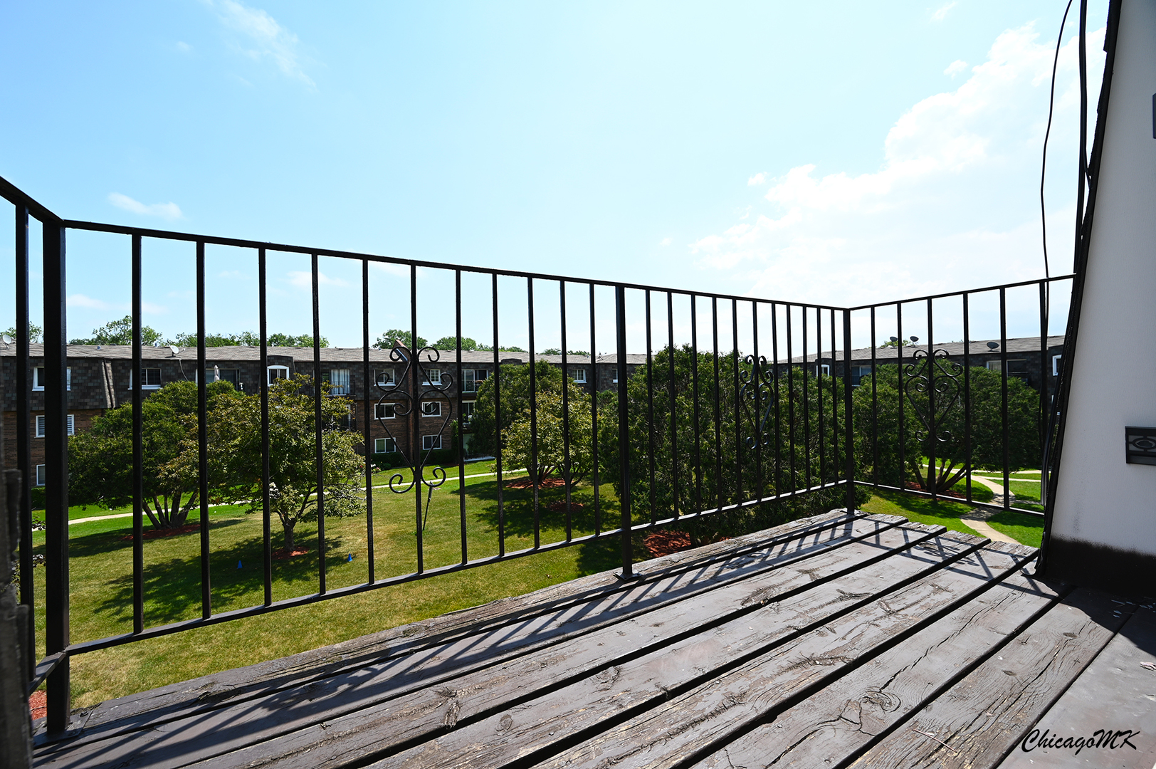 9381 Bay Colony Drive, Unit 3S Des Plaines, IL 60016 - Photo 31 of 43 a view of a balcony with a book