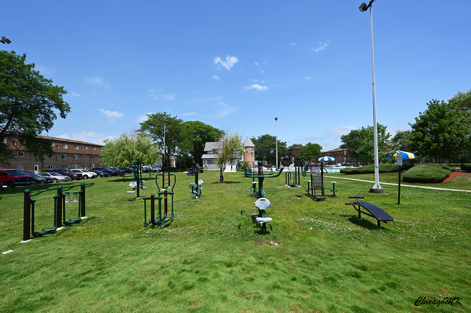 9381 Bay Colony Drive, Unit 3S Des Plaines, IL 60016 - Photo 41 of 43 a view of a park with swings