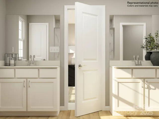 a white toilet sitting next to a bathroom sink