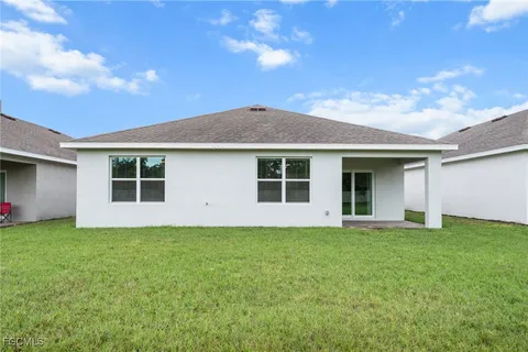 front view of a house with a yard
