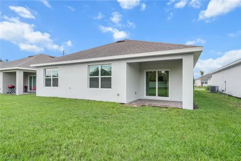 a view of a house with a garden