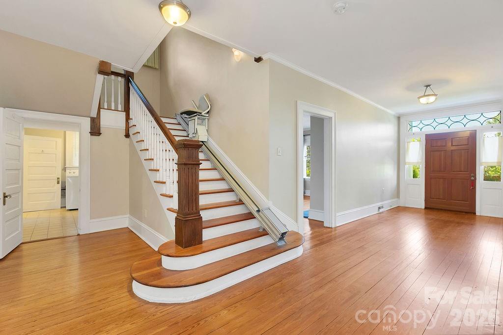 208 West Probart Street Brevard, NC 28712 - Photo 22 of 48 a view of entryway and hall with wooden floor