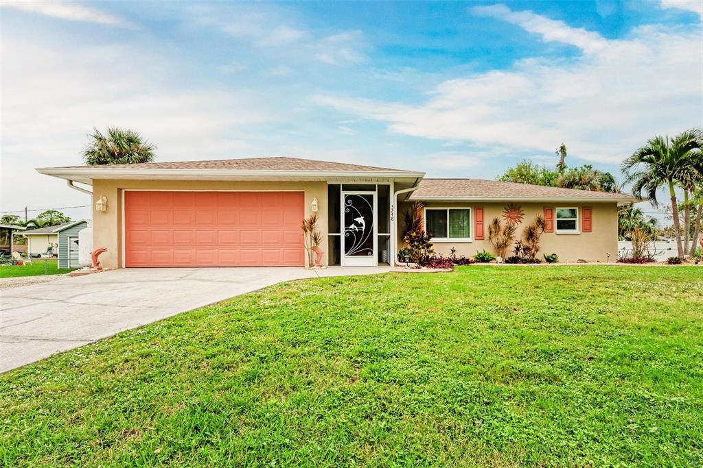 3248 Hercules Road Venice, FL 34293 - Photo 1 of 1 front view of a house with a yard
