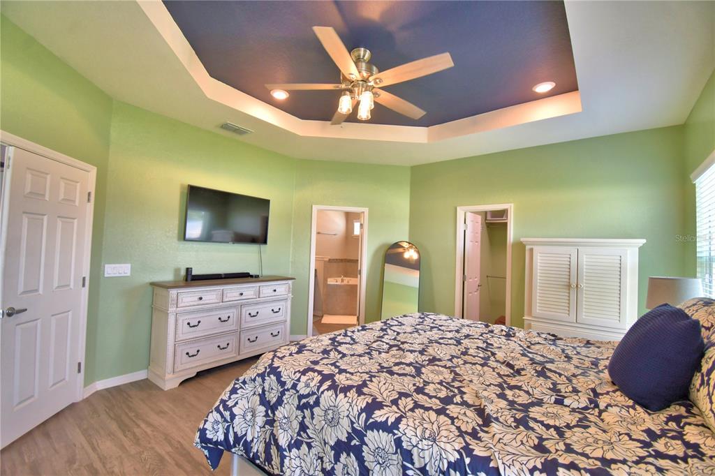 4340 Reding Way Lakeland, FL 33813 - Photo 44 of 63 a bedroom with a bed and a flat screen tv