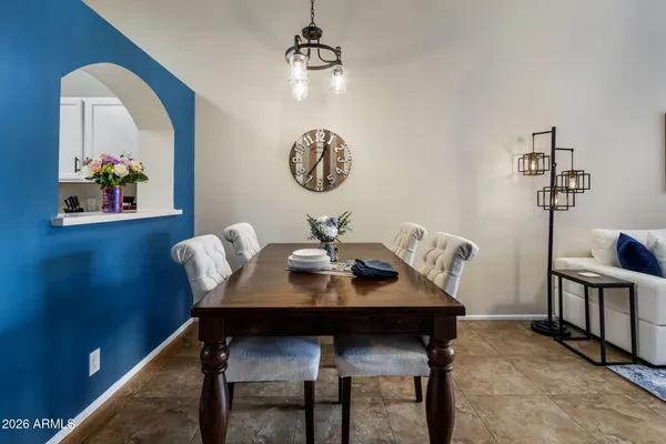 a view of a dining room with furniture