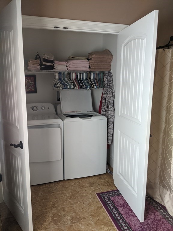 20 Paddock Circle, Unit 20 Salem, NH 03079 - Photo 16 of 29 a utility room with dryer and washer