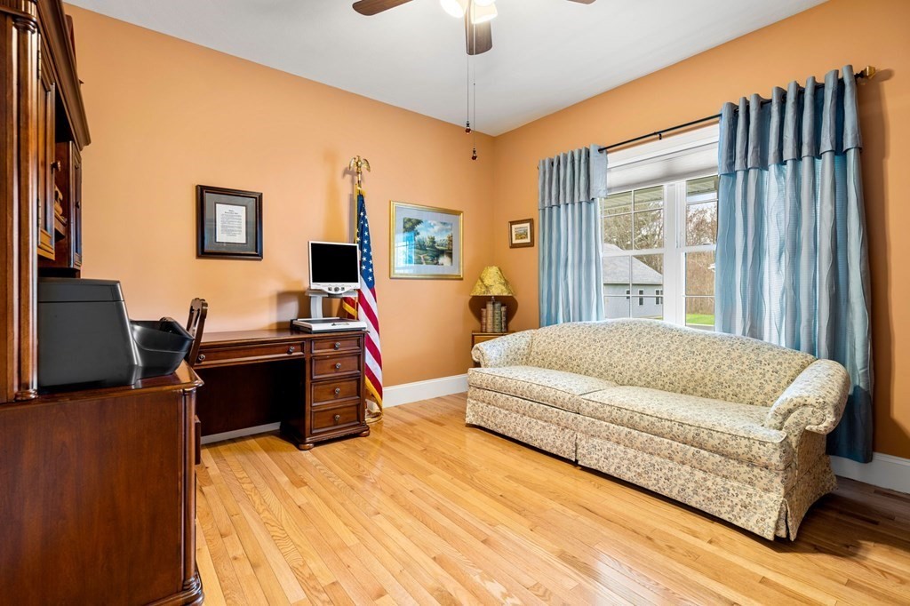20 Paddock Circle, Unit 20 Salem, NH 03079 - Photo 18 of 29 a bedroom with a bed and a flat screen tv