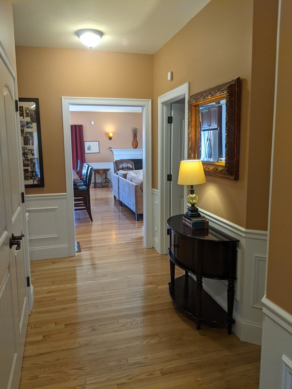 20 Paddock Circle, Unit 20 Salem, NH 03079 - Photo 7 of 29 a living room with furniture and a table