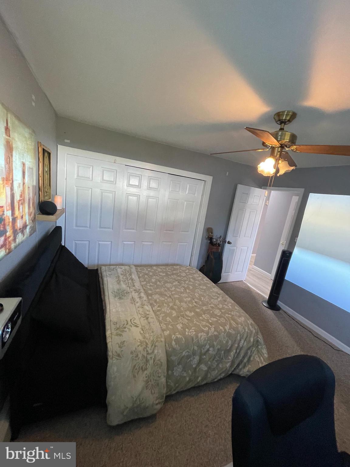 22 Myrtle Lane Levittown, PA 19054 - Photo 15 of 20 a bedroom with a bed and wooden floor