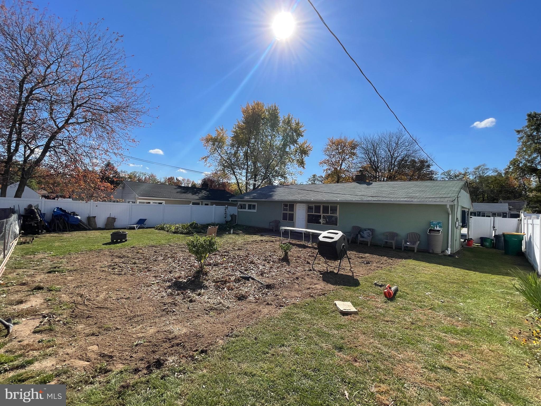 22 Myrtle Lane Levittown, PA 19054 - Photo 19 of 20 a view of a backyard with a sitting area