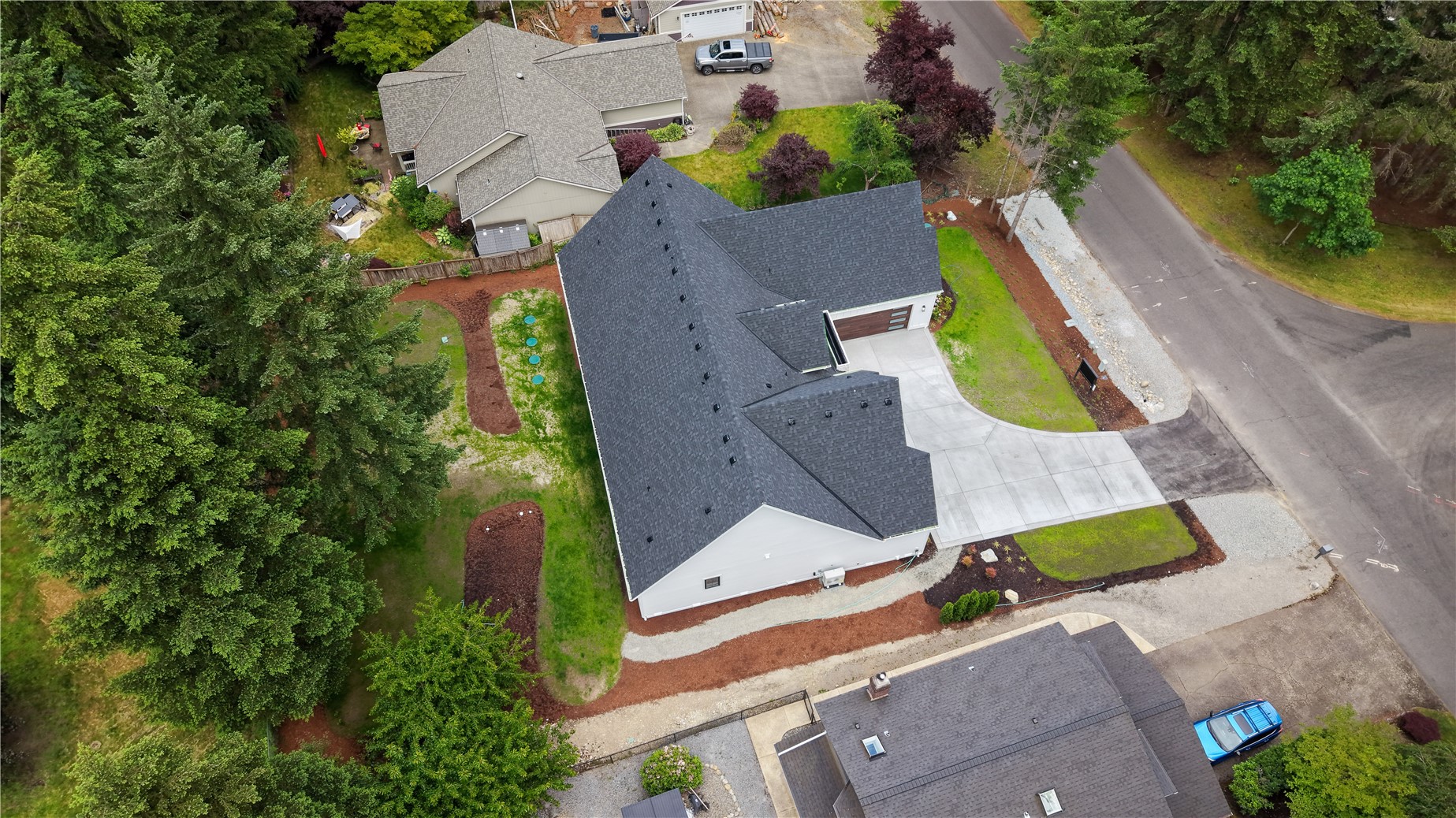 6709 254th Street East Graham, WA 98338 - Photo 37 of 40 an aerial view of a house with a swimming pool