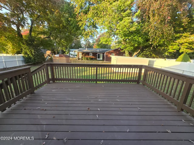 a view of a deck with a trees