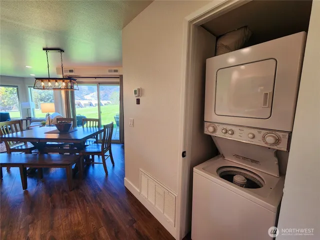 a view of kitchen and dining room with furniture