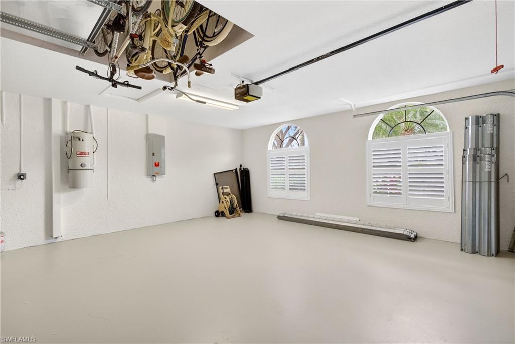 8968 Morgan Court Naples, FL 34113 - Photo 22 of 32 a view of a livingroom with a staircase