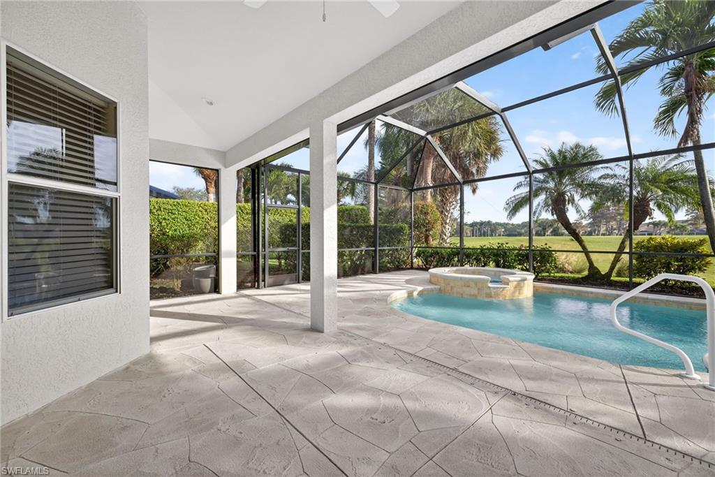 8968 Morgan Court Naples, FL 34113 - Photo 23 of 32 a view of swimming pool with a patio