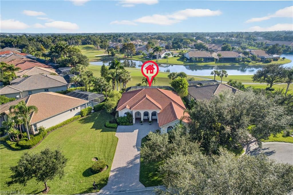 8968 Morgan Court Naples, FL 34113 - Photo 27 of 32 an aerial view of residential houses with outdoor space