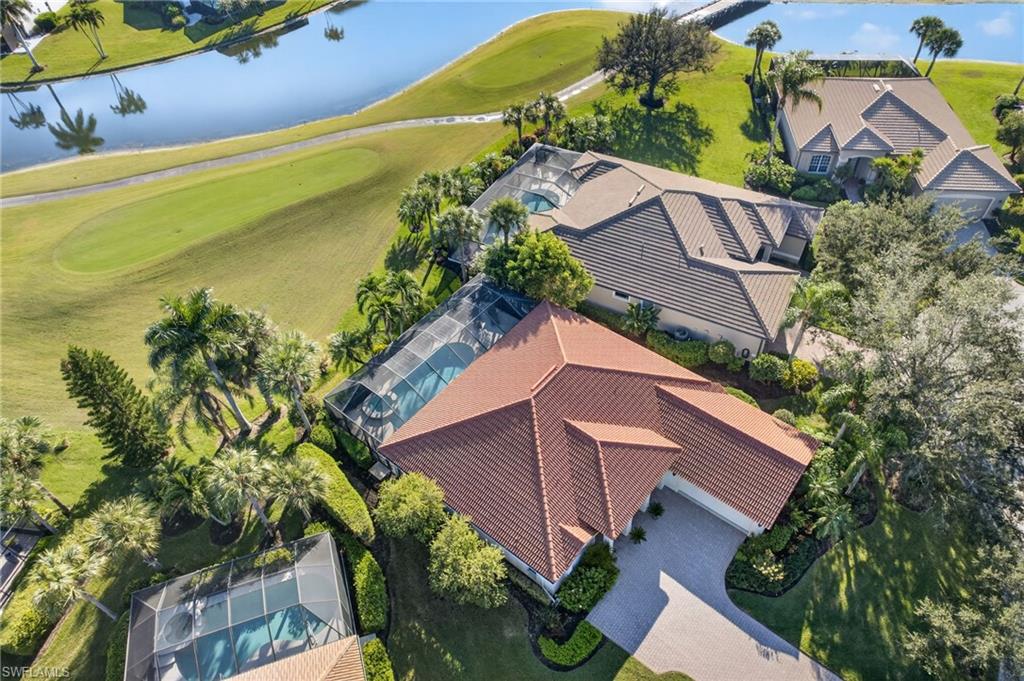 8968 Morgan Court Naples, FL 34113 - Photo 29 of 32 an aerial view of residential houses with outdoor space