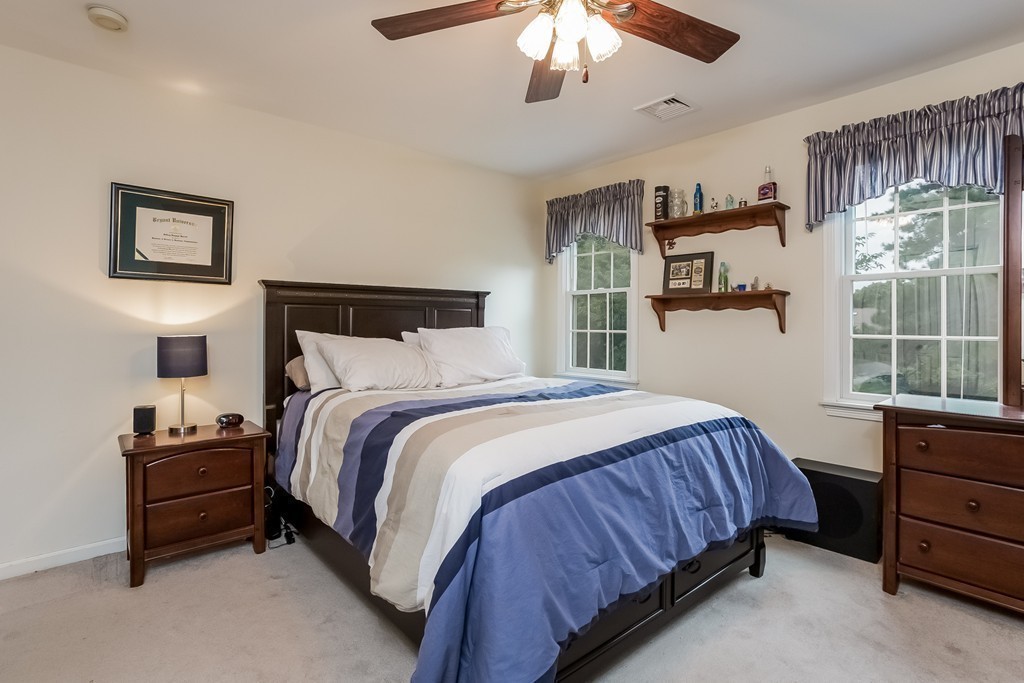 115 Bullivant Farm Road Marion, MA 02738 - Photo 16 of 30 a bedroom with a bed and a window