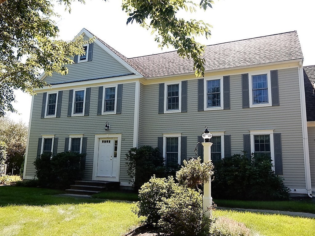 115 Bullivant Farm Road Marion, MA 02738 - Photo 8 of 30 a front view of a house with a yard and a garden