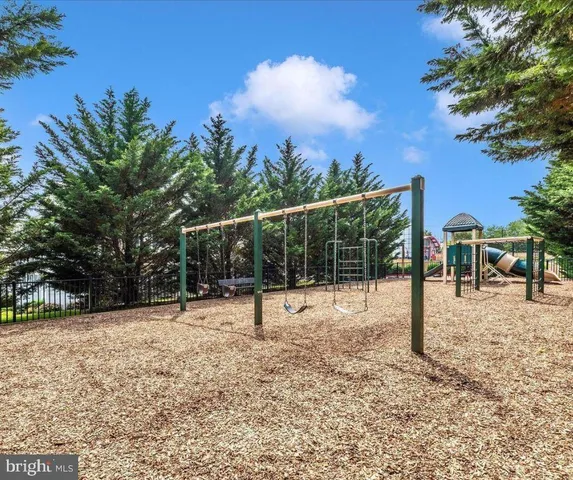 a view of outdoor space with swings