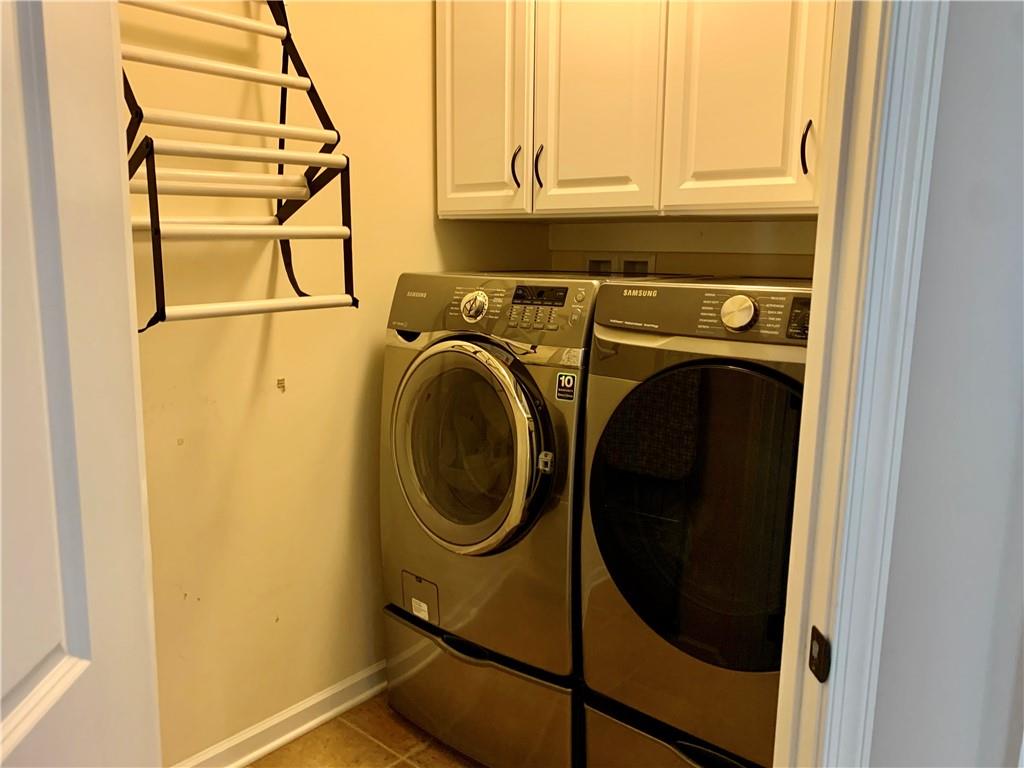 119 Timothy Trail Beaver, PA 15009 - Photo 21 of 38 Main level laundry with additional custom cabinets