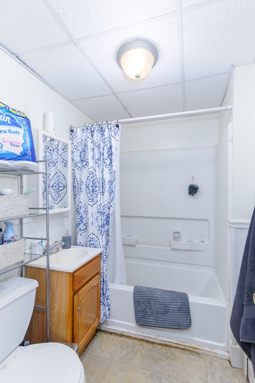 52 Grove Street Spencer, MA 01562 - Photo 11 of 24 a bathroom with a sink a toilet and shower