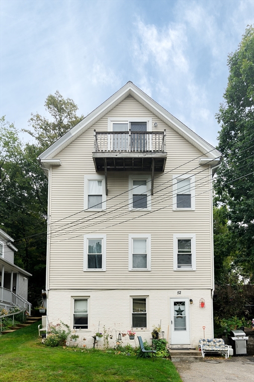 52 Grove Street Spencer, MA 01562 - Photo 2 of 24 a view of a house with garden