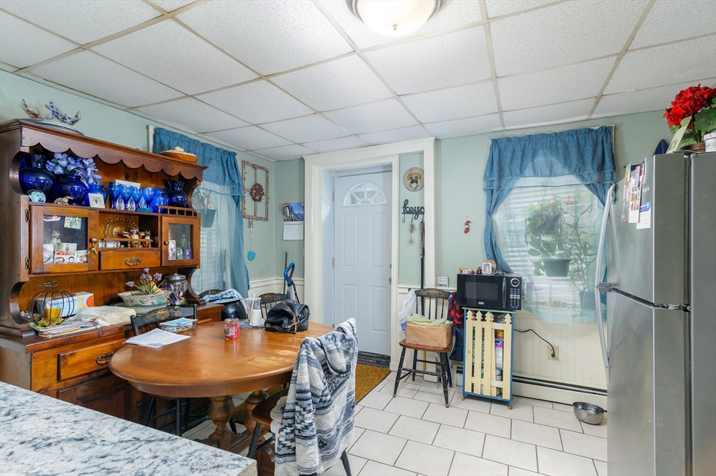 52 Grove Street Spencer, MA 01562 - Photo 8 of 24 a room with musical instruments