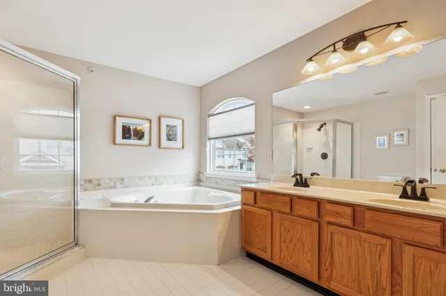 a view of a patio with iron fence