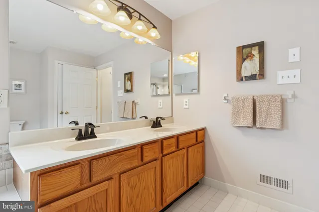 a view of a deck with table and chairs and wooden floor