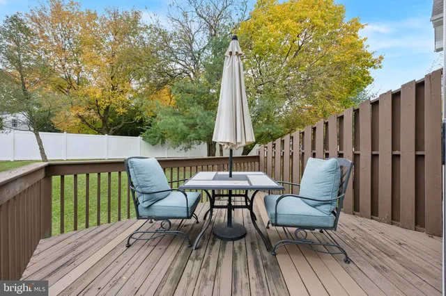 an aerial view of a house with outdoor space