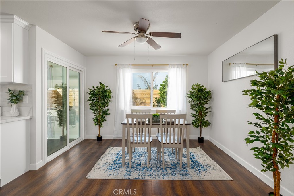 29110 Prestwick Road Menifee, CA 92586 - Photo 13 of 32 a living room with furniture and a potted plant
