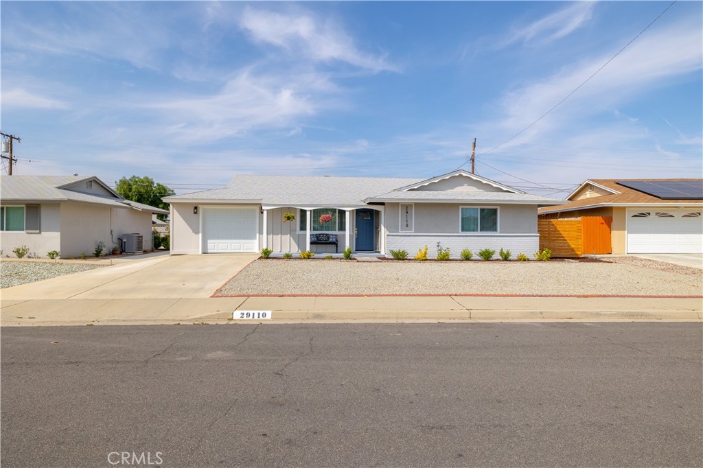 29110 Prestwick Road Menifee, CA 92586 - Photo 32 of 32 front view of house with a yard