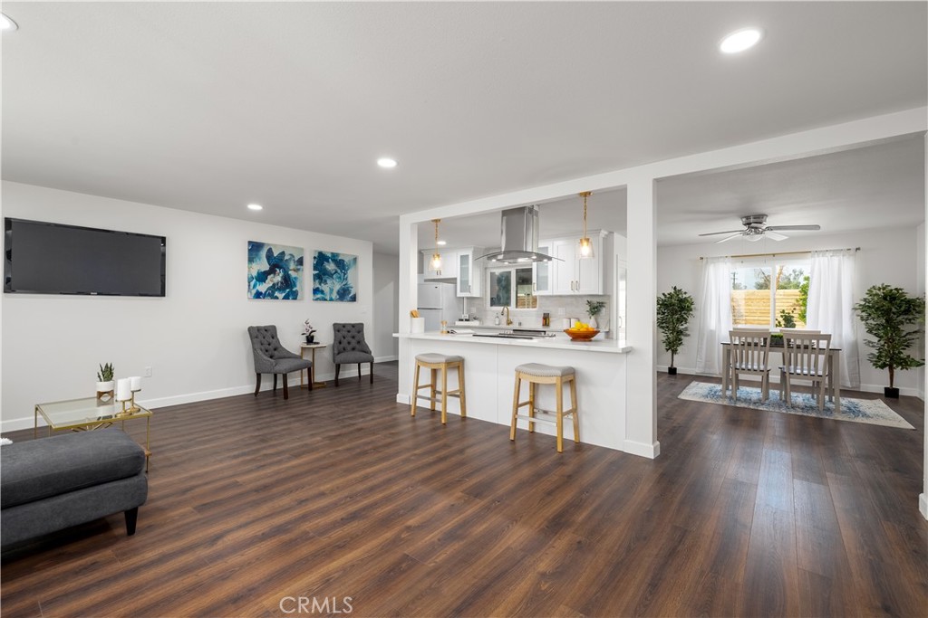 29110 Prestwick Road Menifee, CA 92586 - Photo 8 of 32 a living room with furniture and a wooden floor