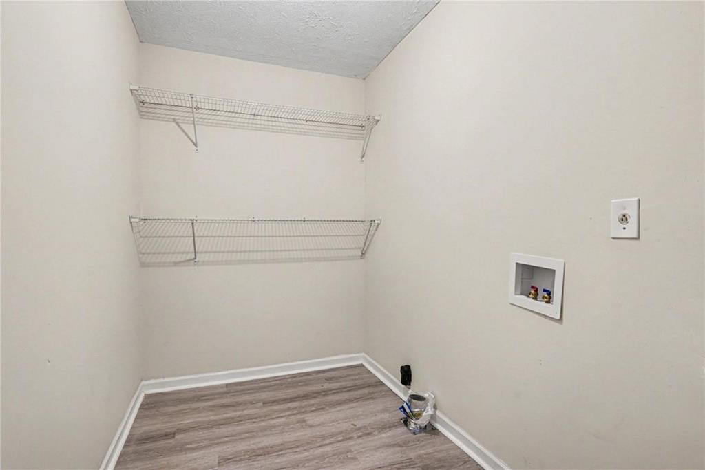 8355 Dunellen Lane Jonesboro, GA 30238 - Photo 20 of 27 a view of a room with empty racks
