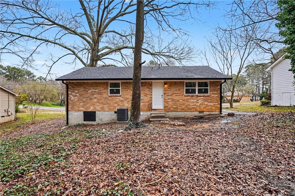 8355 Dunellen Lane Jonesboro, GA 30238 - Photo 6 of 27 a front view of a house with garden
