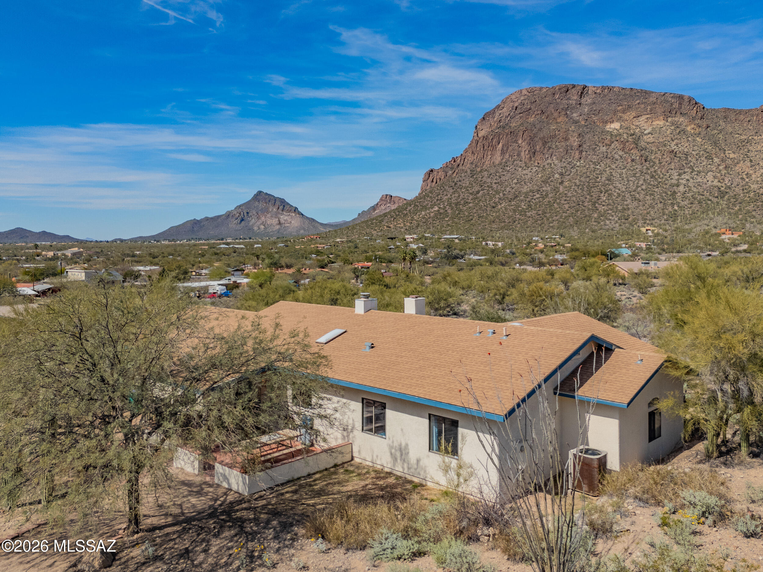 4155 West Coyote Ridge Trail Tucson, AZ 85746 - Photo 8 of 39 a aerial view of a house with a yard
